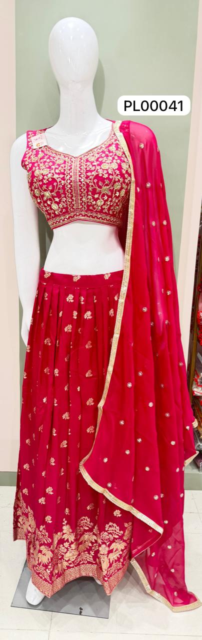 A bright yellow traditional Indian outfit displayed on a white mannequin, featuring a sleeveless embroidered blouse, a matching flared skirt, and a draped dupatta. A product code label 'PL00041' is visible near the top right.